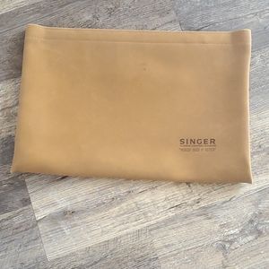 Singer brown synthetic leather bags
